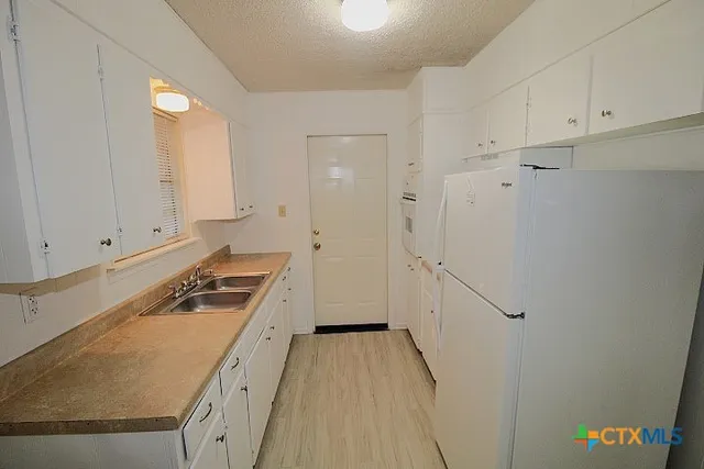 a view of a storage & utility room in a house