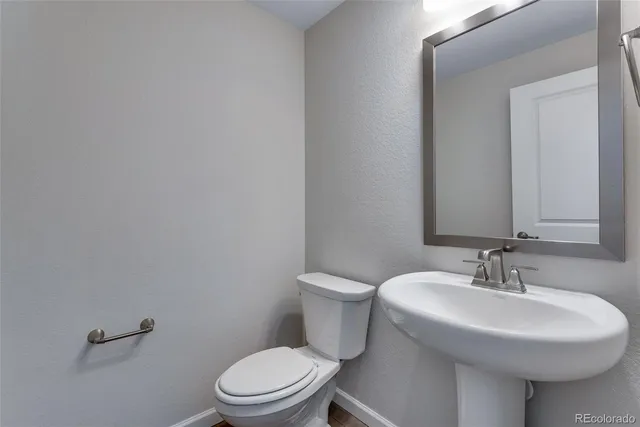 an empty room with a empty space and windows