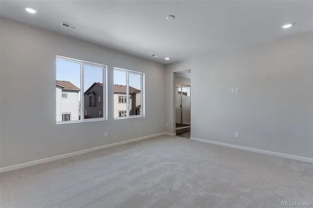 a view of a room with a hallway