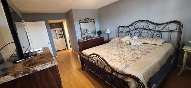 a view of an empty room with a fireplace