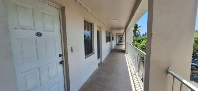 a view of a hallway with a entryway