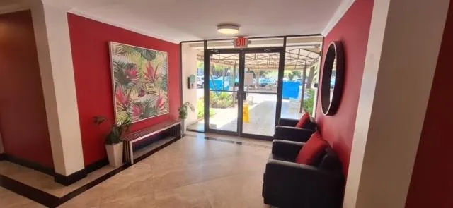 a view of swimming pool from a balcony