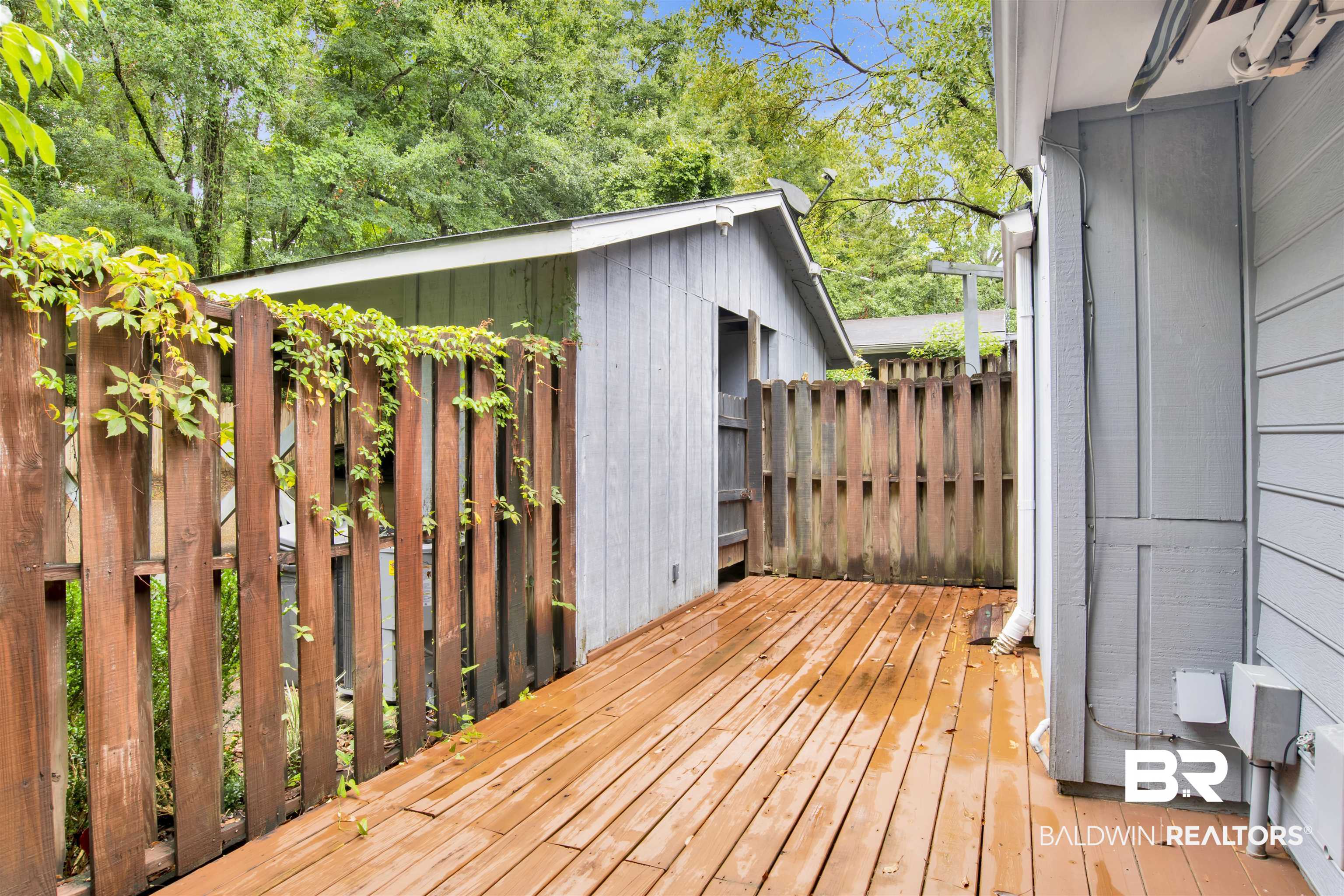 6635 Jackson Square Daphne, AL 36526 - Photo 22 of 24 Fenced Courtyard to Carport