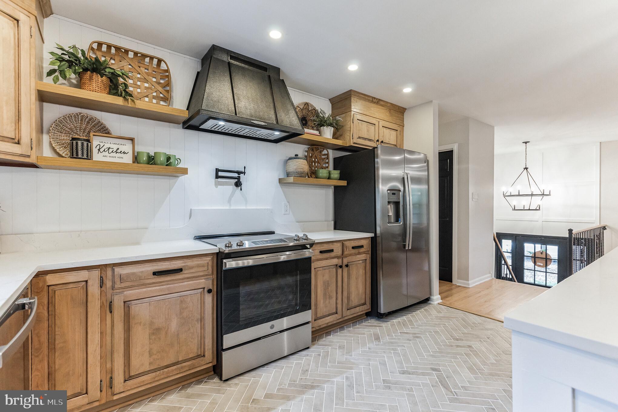 226 Forest Avenue Medford, NJ 08055 - Photo 1 of 39 a kitchen with stainless steel appliances granite countertop a refrigerator a stove and a sink