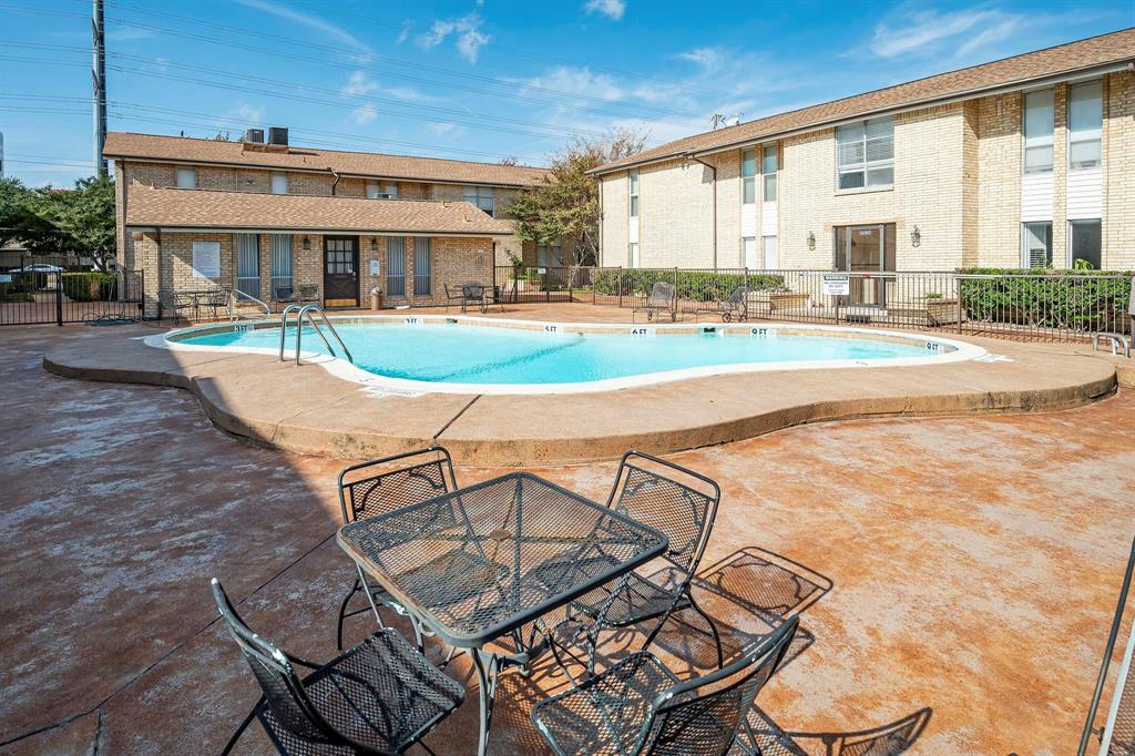 5812 Milton Street, Unit 105 Dallas, TX 75206 - Photo 11 of 12 a view of a swimming pool with a patio