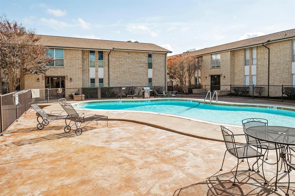 5812 Milton Street, Unit 105 Dallas, TX 75206 - Photo 12 of 12 a view of swimming pool with outdoor seating and a yard