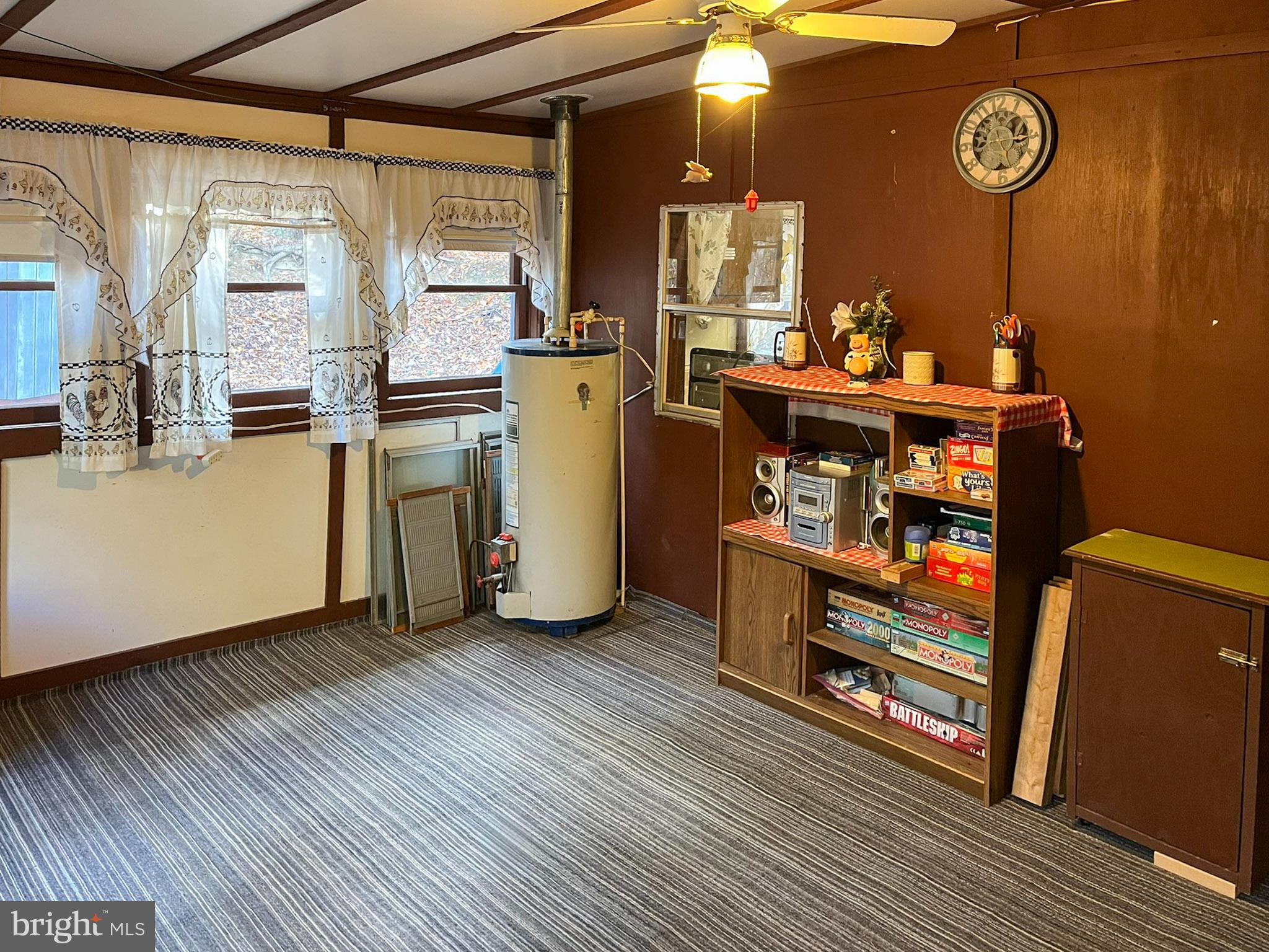 9766 Valley View Road Three Springs, PA 17264 - Photo 13 of 40 a room with wooden floor and furniture