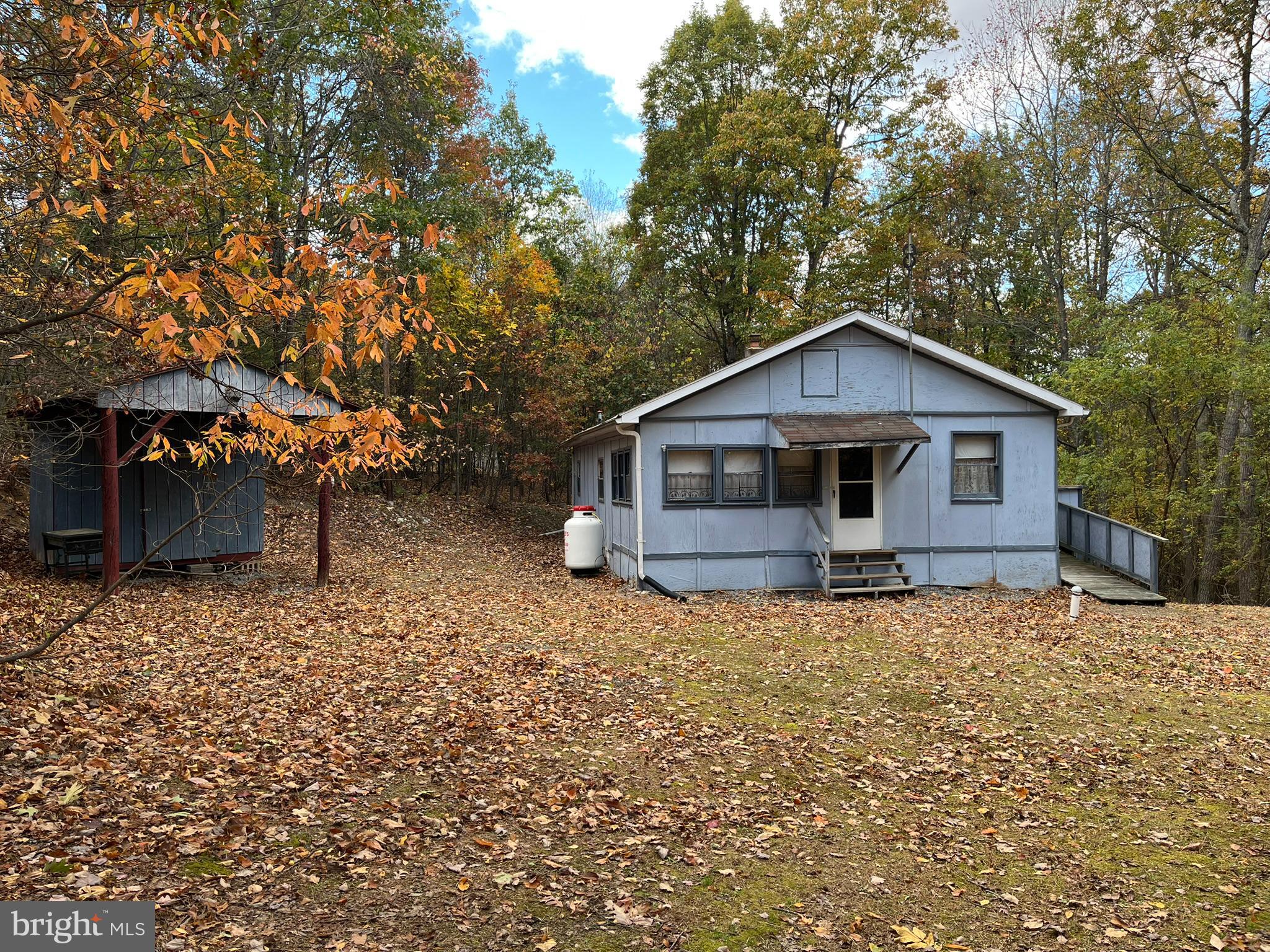 9766 Valley View Road Three Springs, PA 17264 - Photo 2 of 40 a view of a house with a yard