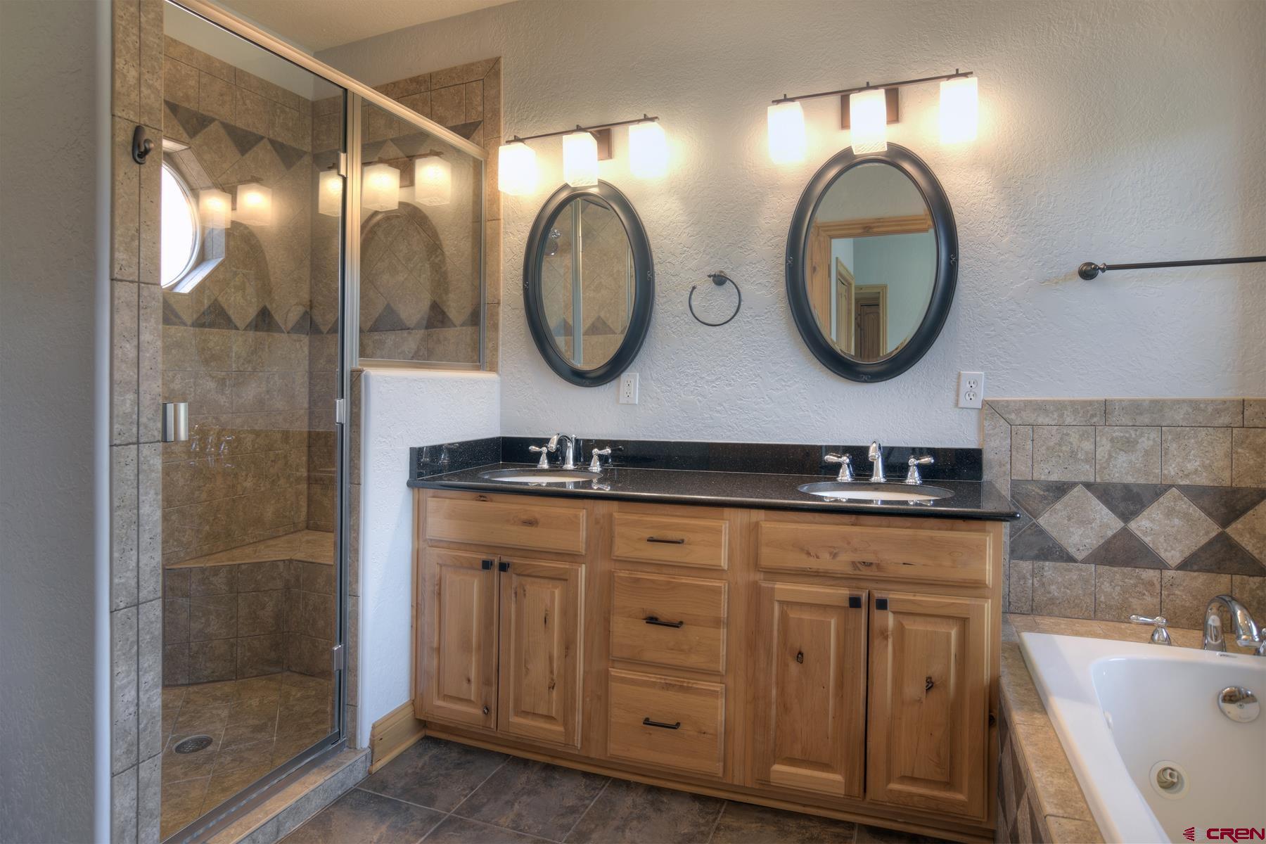 2855 Main Avenue, Unit A204 Durango, CO 81301 - Photo 19 of 45 a bathroom with a sink and a mirror