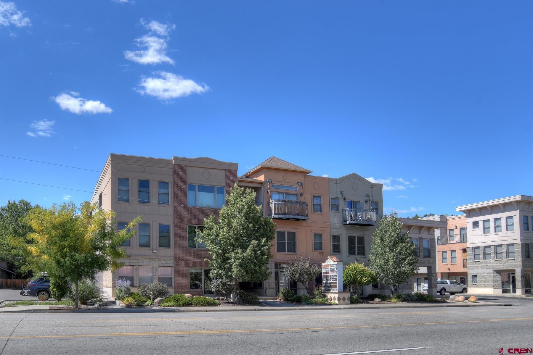 2855 Main Avenue, Unit A204 Durango, CO 81301 - Photo 2 of 45 a view of a city with tall buildings