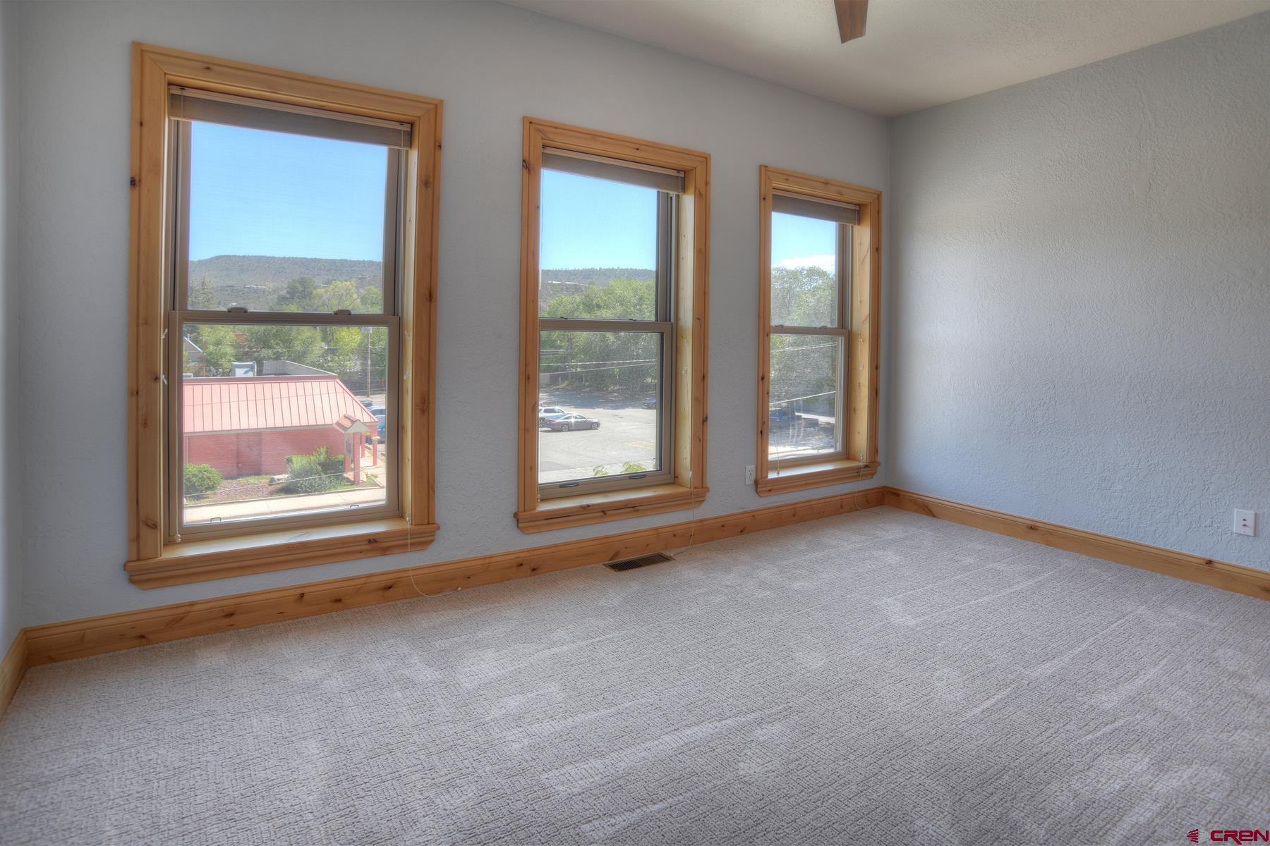 2855 Main Avenue, Unit A204 Durango, CO 81301 - Photo 27 of 45 an empty room with windows