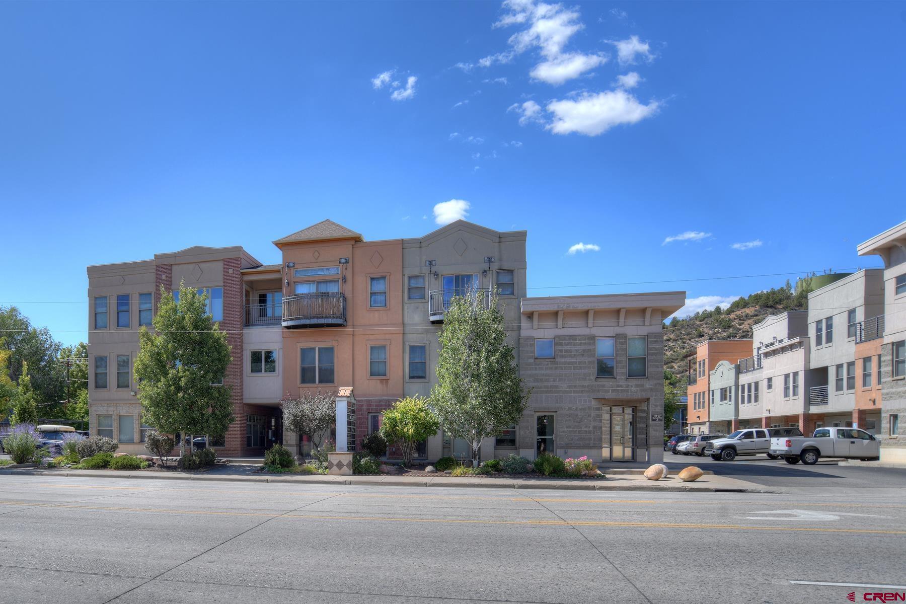 2855 Main Avenue, Unit A204 Durango, CO 81301 - Photo 37 of 45 a city view with tall buildings and a street light