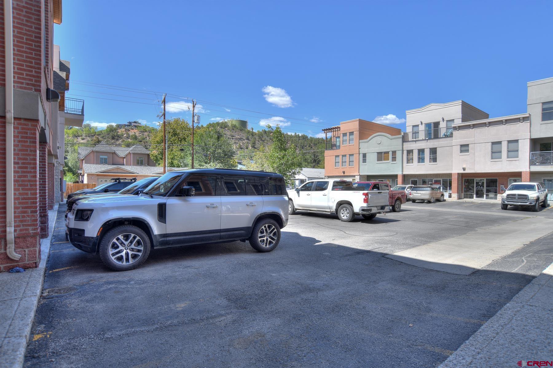 2855 Main Avenue, Unit A204 Durango, CO 81301 - Photo 39 of 45 a view of a cars parked in front of a building