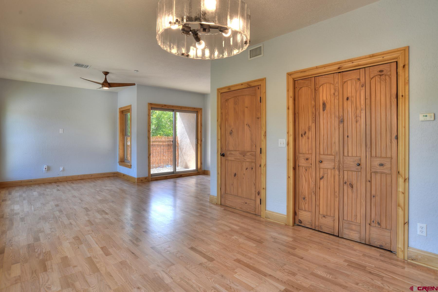 2855 Main Avenue, Unit A204 Durango, CO 81301 - Photo 8 of 45 wooden floor in an empty room with a window