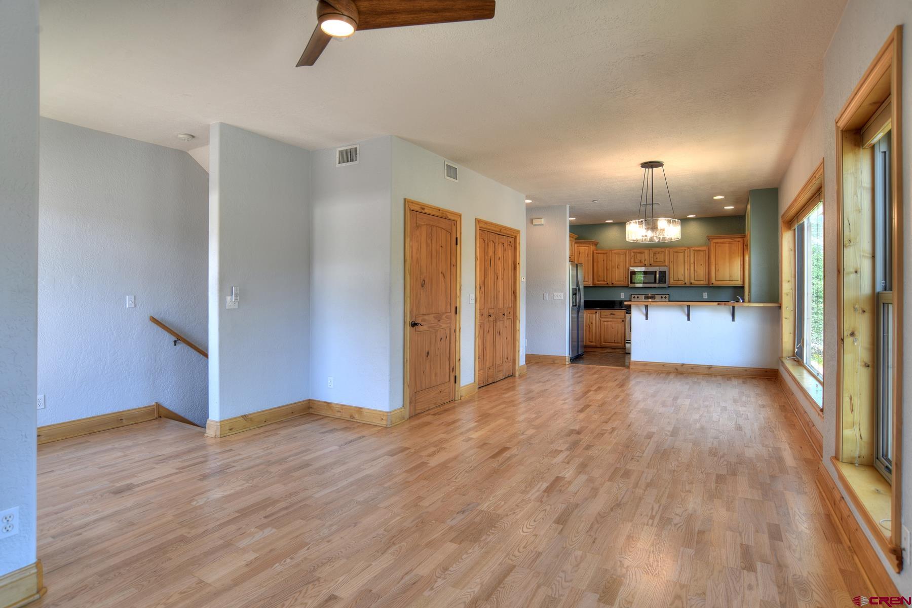2855 Main Avenue, Unit A204 Durango, CO 81301 - Photo 9 of 45 a view of a kitchen with wooden floor and a kitchen