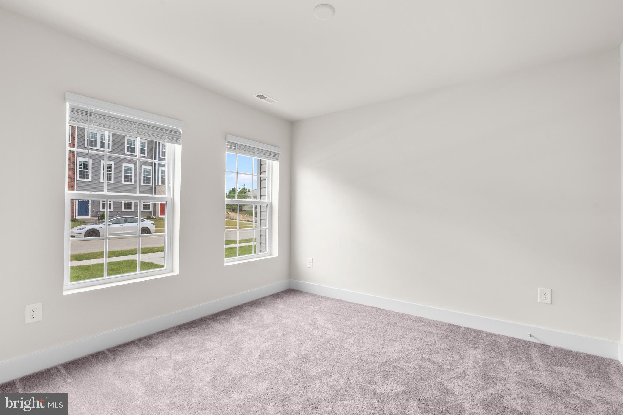 1826 Parham Way Windsor Mill, MD 21244 - Photo 32 of 37 an empty room with windows