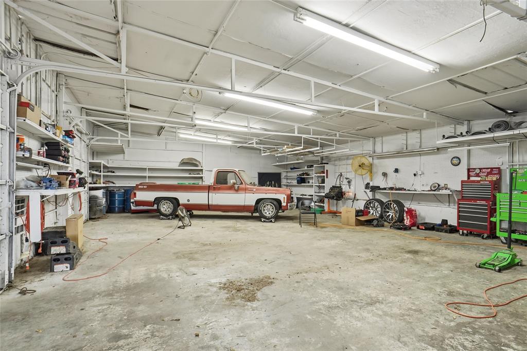 207 School House Road Paradise, TX 76073 - Photo 31 of 33 a view of parking garage with cars
