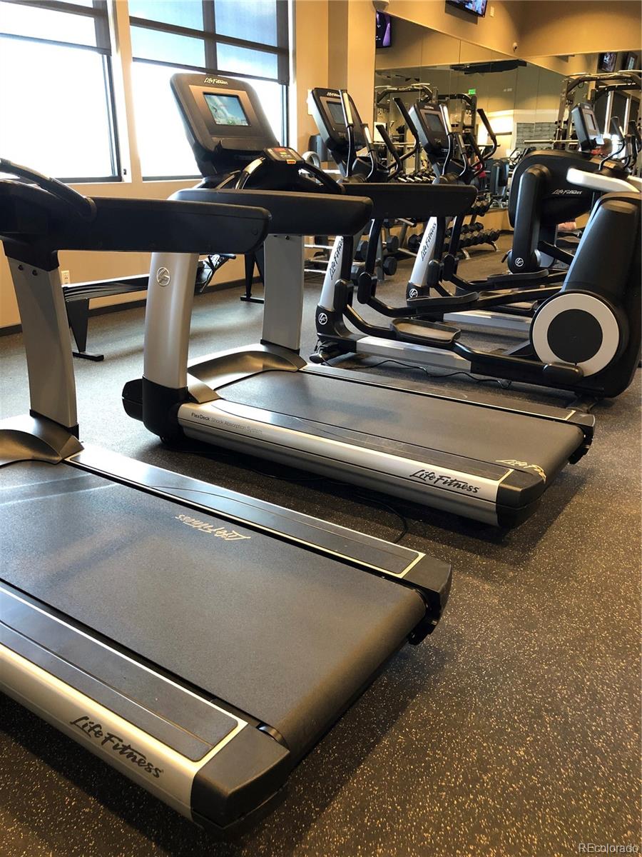 12865 Bay Street Firestone, CO 80504 - Photo 18 of 22 a view of a room with gym equipment