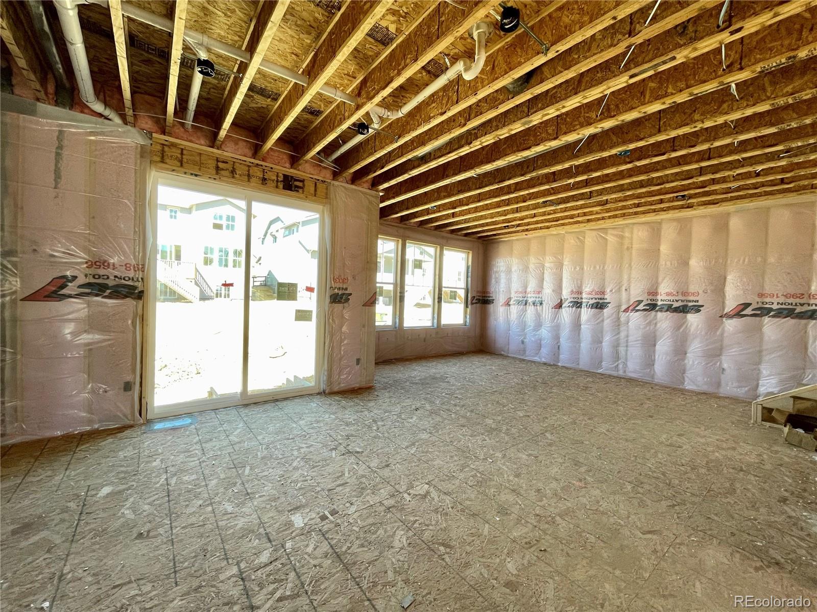 12865 Bay Street Firestone, CO 80504 - Photo 2 of 22 a view of an empty room