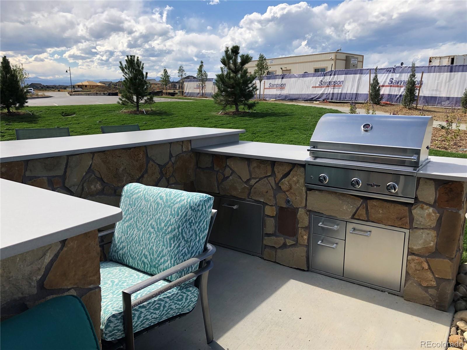 12865 Bay Street Firestone, CO 80504 - Photo 22 of 22 a view of a chairs and table in the terrace