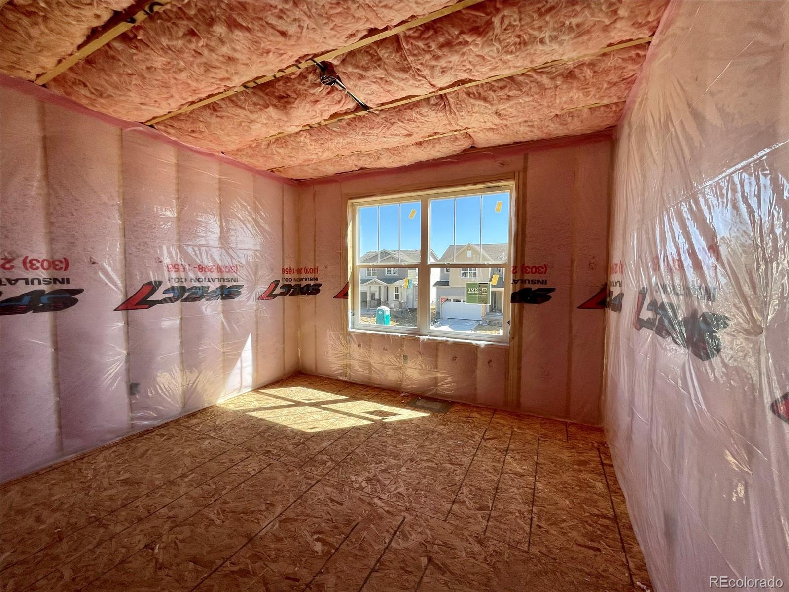 12865 Bay Street Firestone, CO 80504 - Photo 6 of 22 a view of empty room with windows