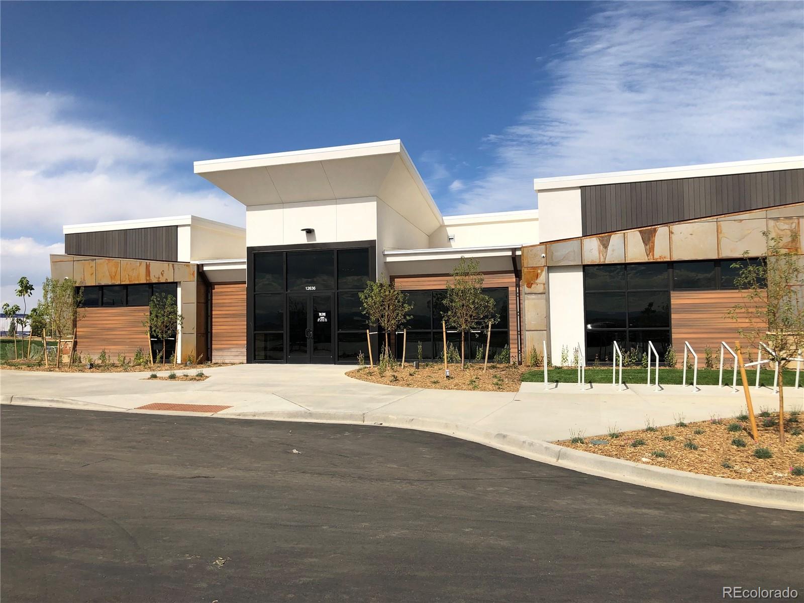 12865 Bay Street Firestone, CO 80504 - Photo 10 of 22 a view of a building with street