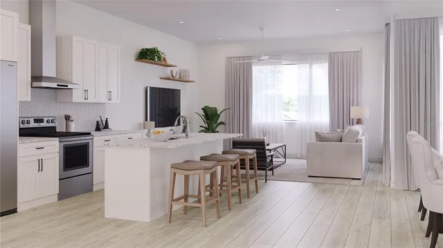 a view of a dining room with furniture and window