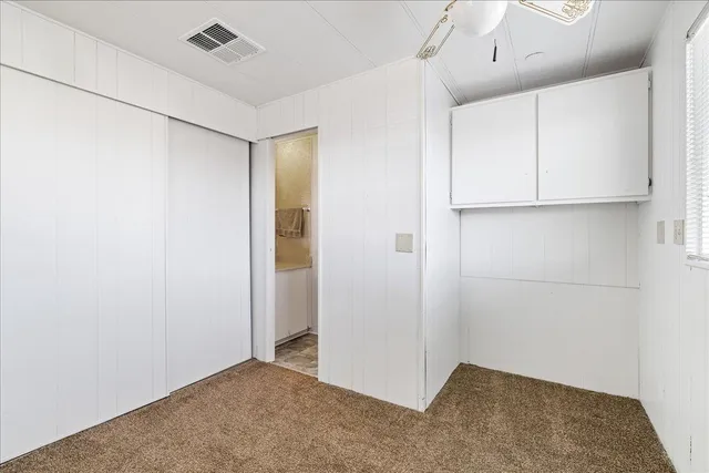 an empty room with closet