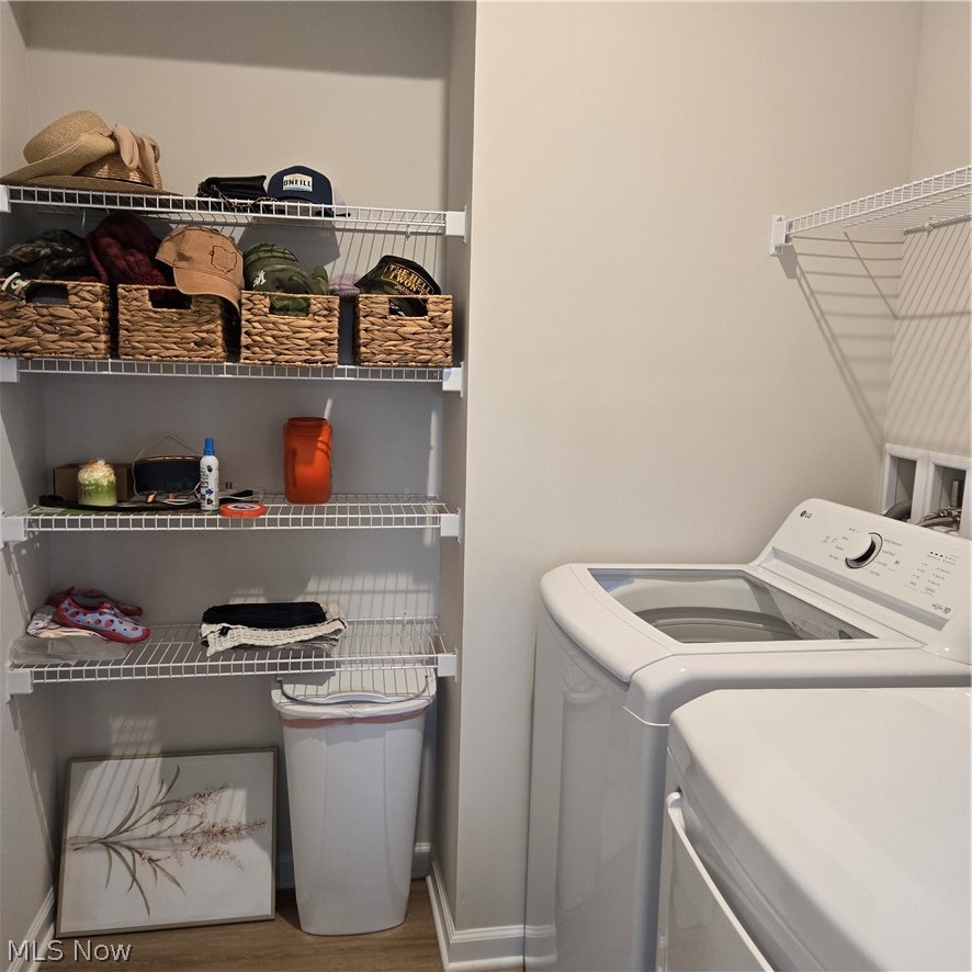 15229 Timber Ridge Drive Middlefield, OH 44062 - Photo 21 of 30 FIRST FLOOR LAUNDRY ROOM WITH STORAGE SPACE.