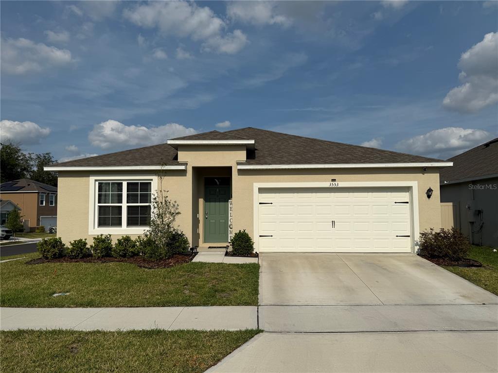 3553 Wynwood Forest Drive Ocoee, FL 34761 - Photo 1 of 1 a front view of a house with a yard