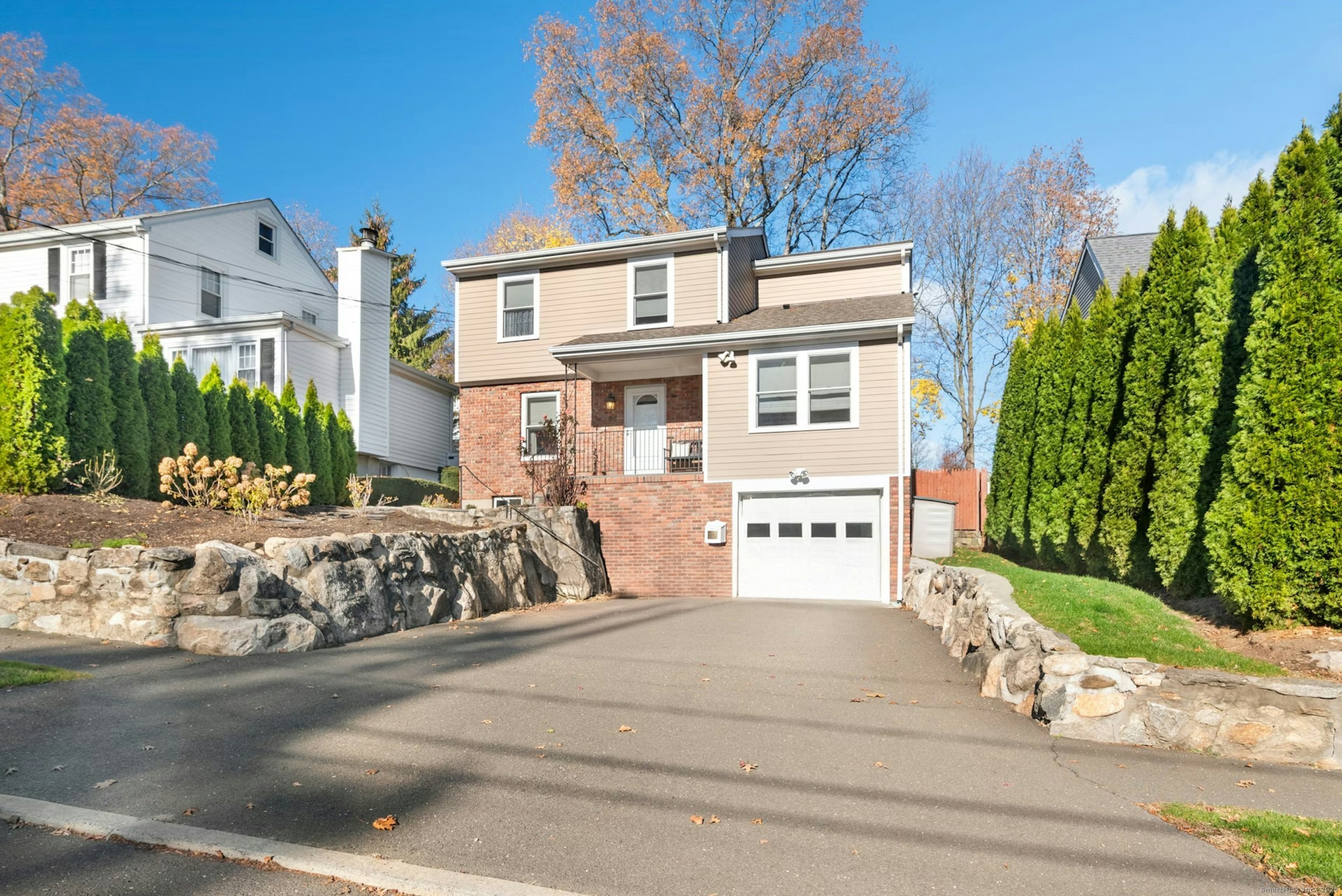 front view of a house with a street