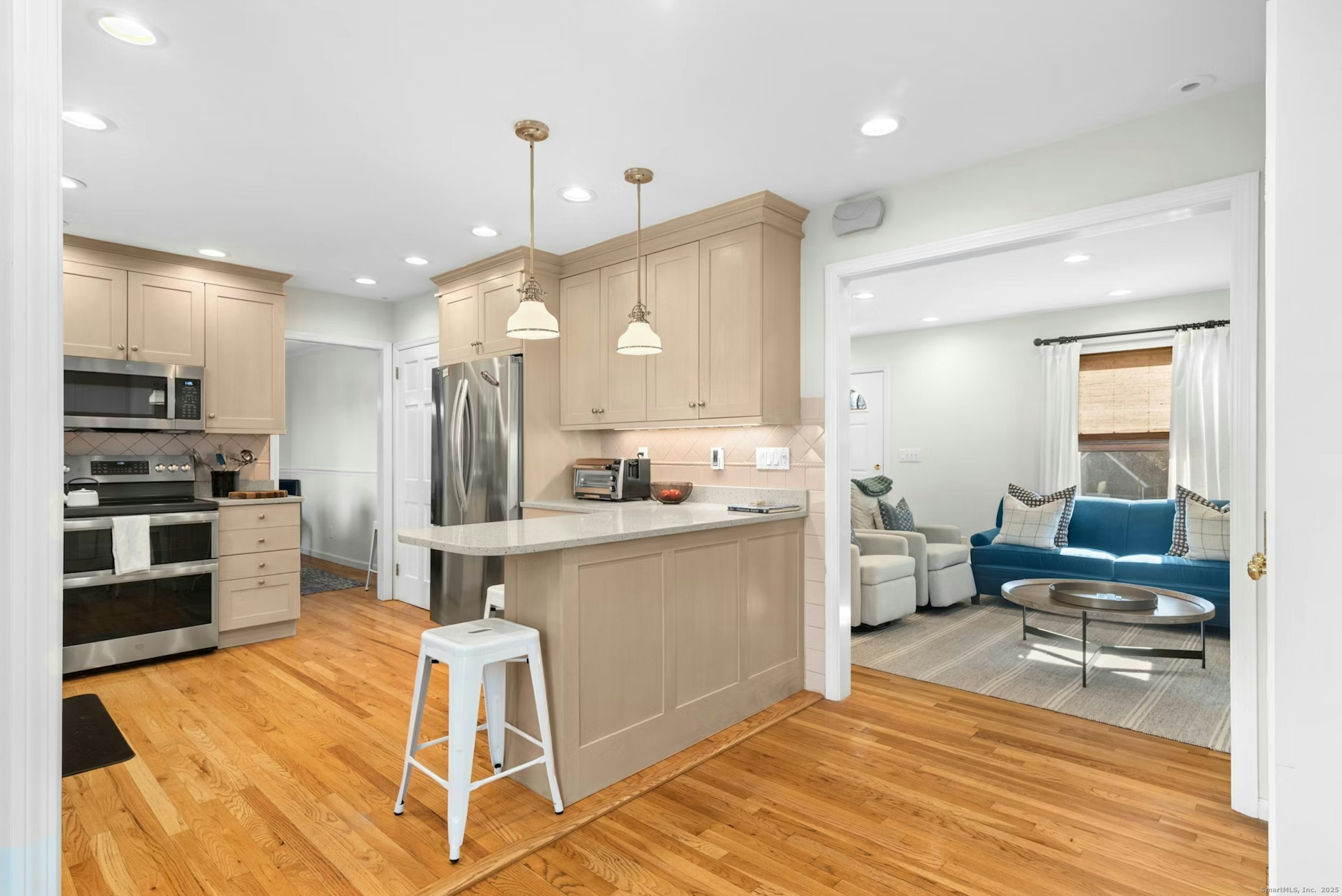 85 Hirsch Road Stamford, CT 06905 - Photo 26 of 27 a open kitchen with stainless steel appliances kitchen island granite countertop a sink and cabinets