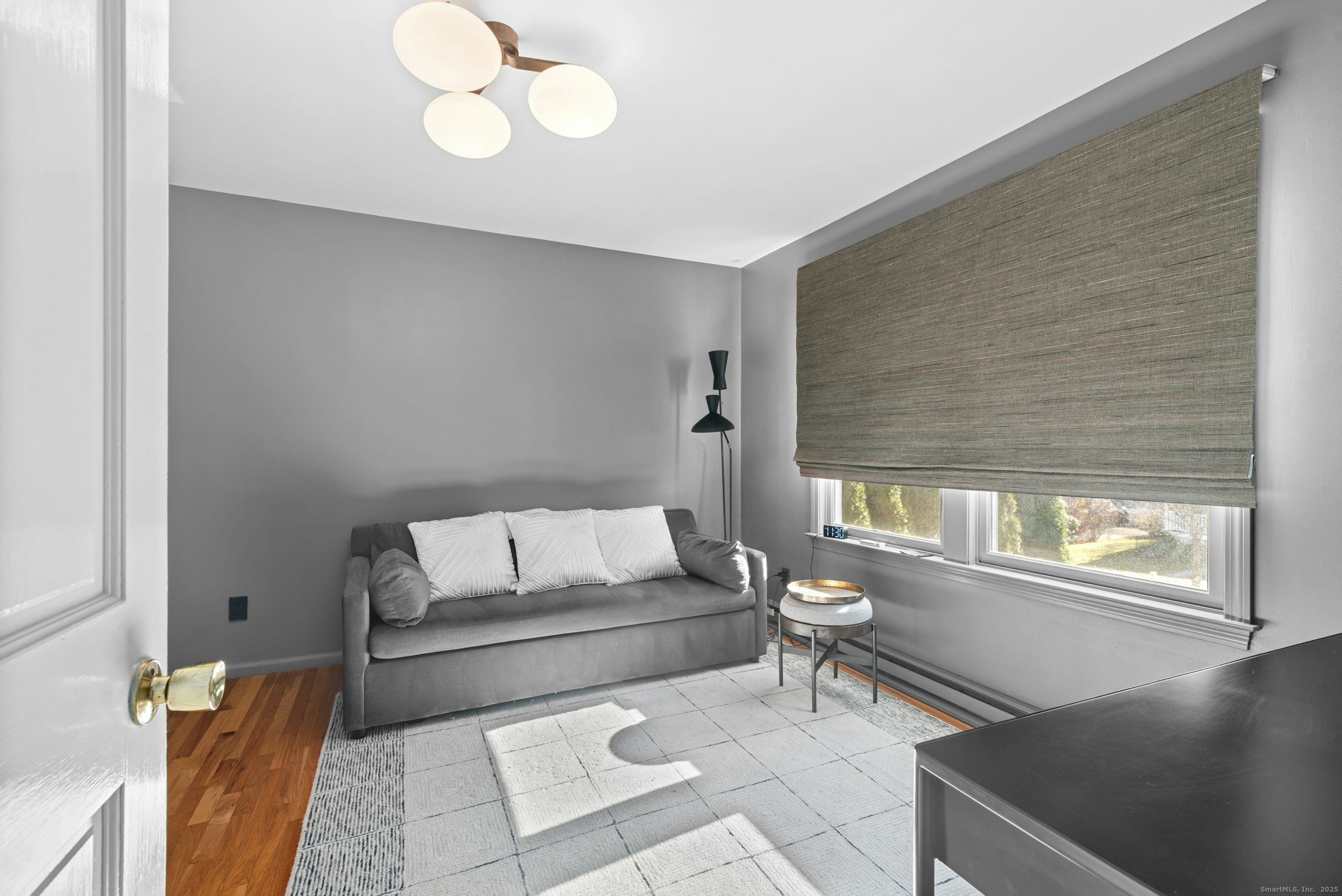 85 Hirsch Road Stamford, CT 06905 - Photo 12 of 27 a living room with furniture and a window