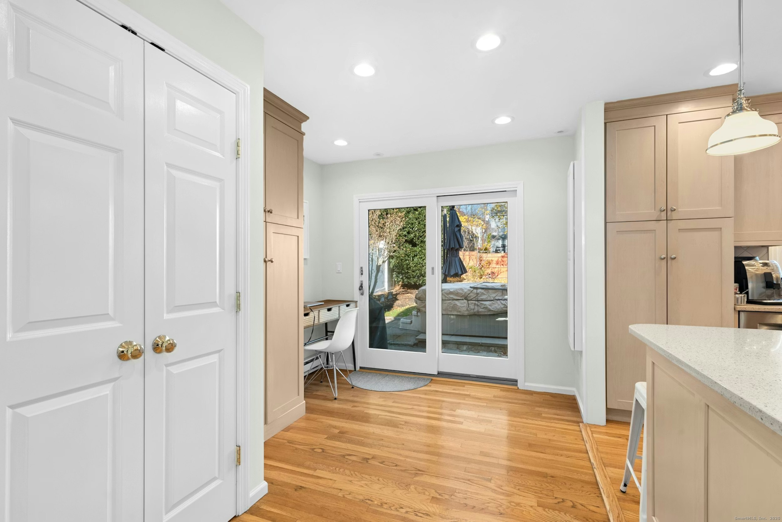 85 Hirsch Road Stamford, CT 06905 - Photo 8 of 27 a view of a hallway with furniture and front door