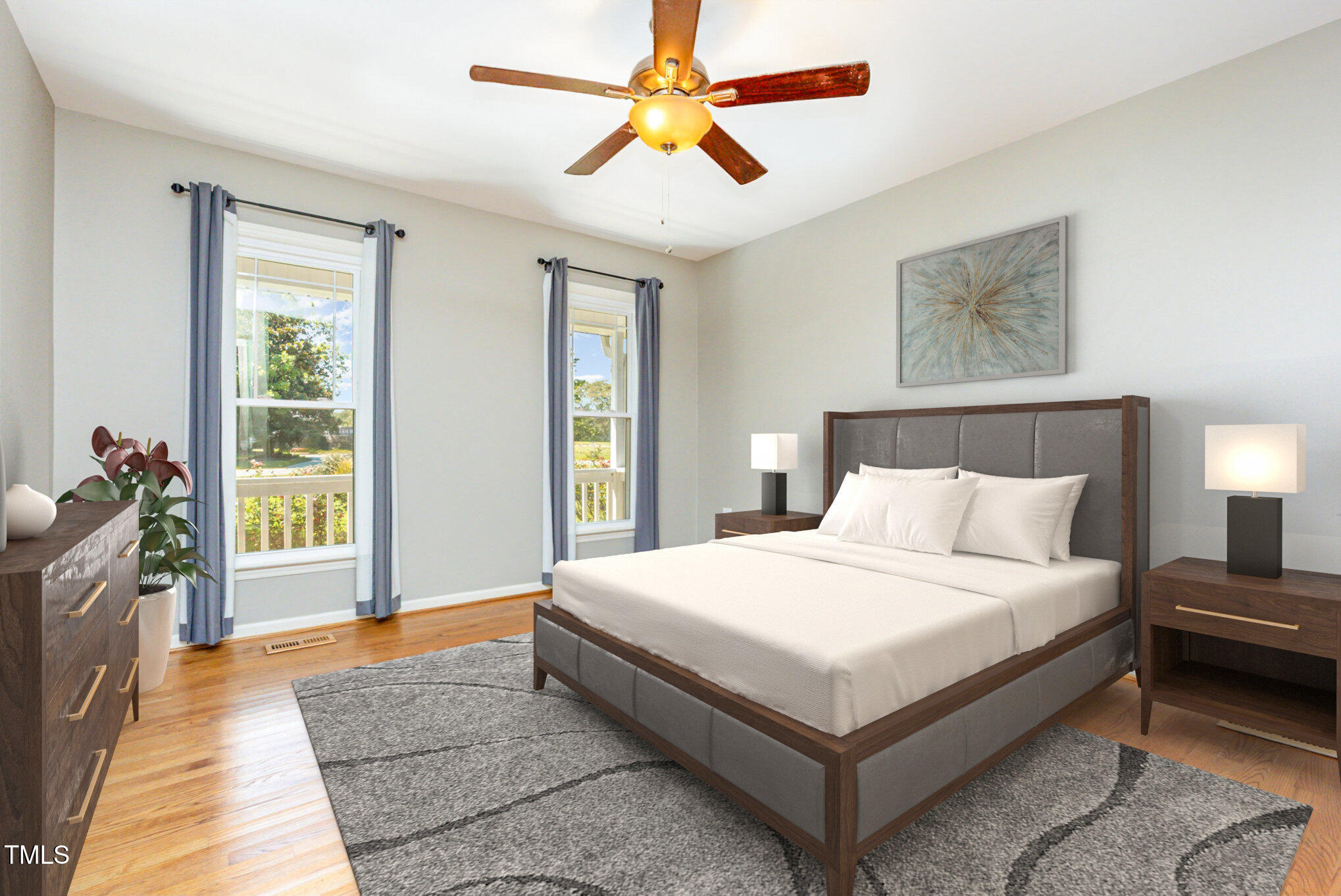823 Shadow Lake Drive Willow Spring, NC 27592 - Photo 14 of 31 a large bedroom with a bed and a chandelier