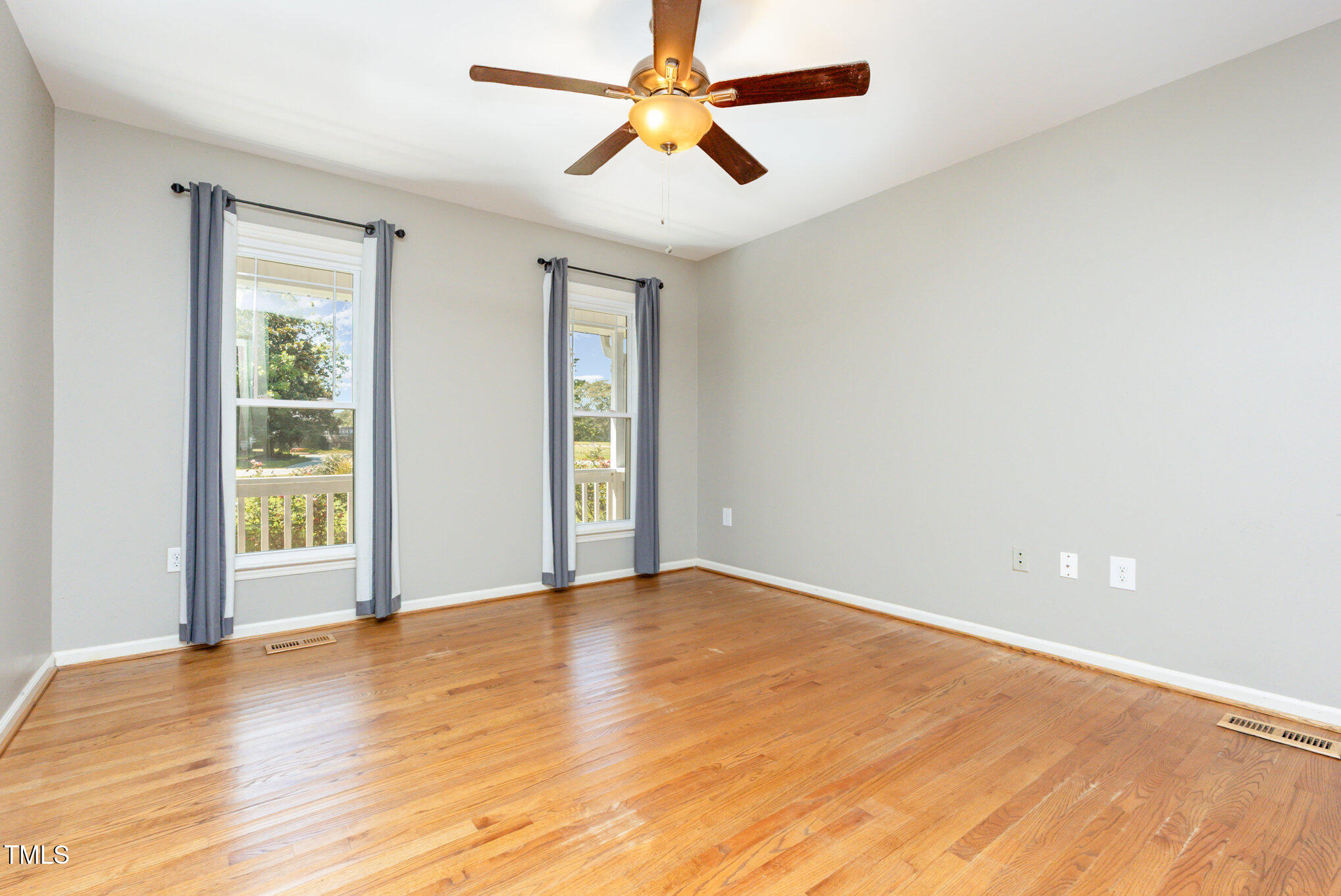 823 Shadow Lake Drive Willow Spring, NC 27592 - Photo 15 of 31 a view of an empty room with window and a kitchen