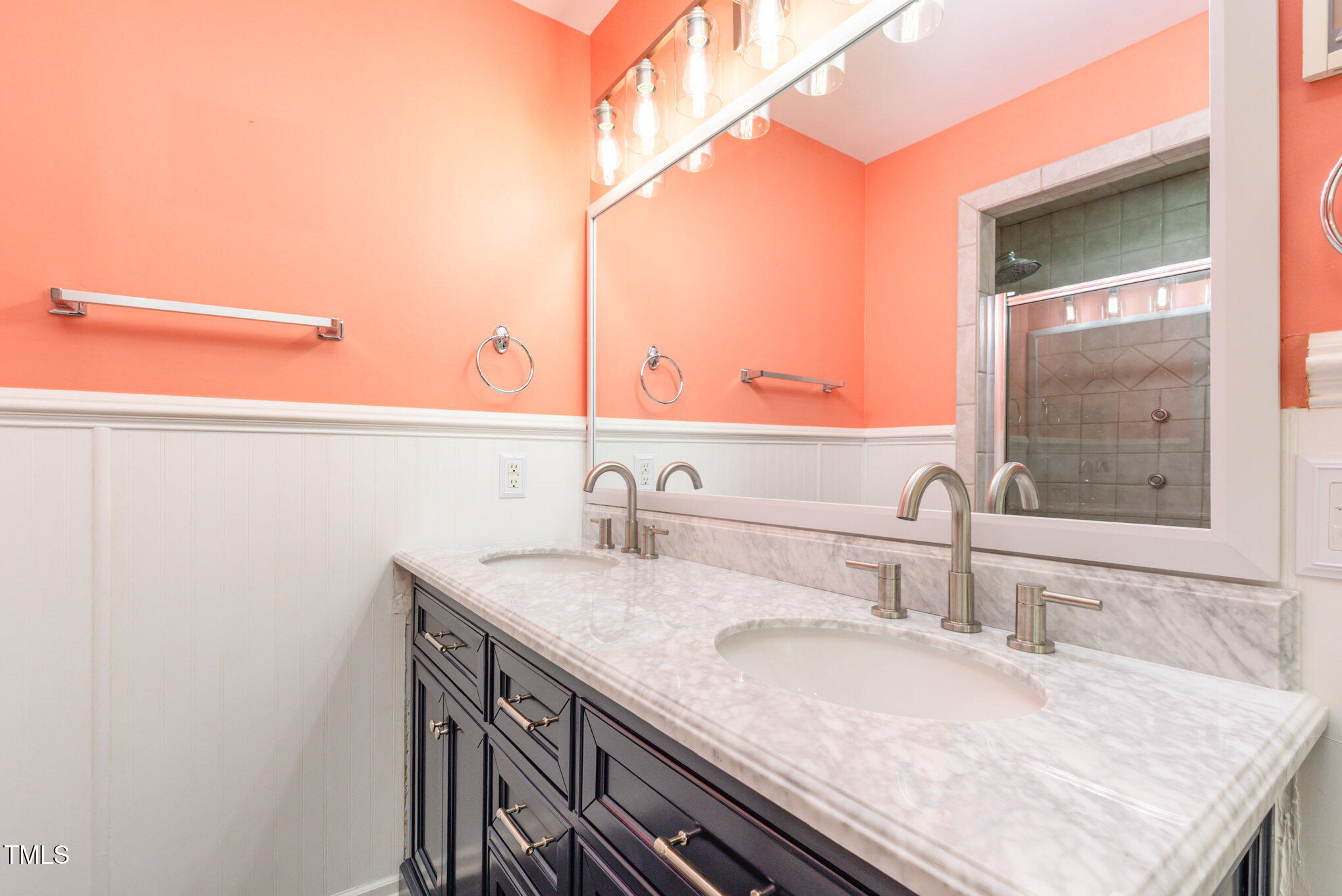823 Shadow Lake Drive Willow Spring, NC 27592 - Photo 16 of 31 a bathroom with a granite countertop sink and a mirror