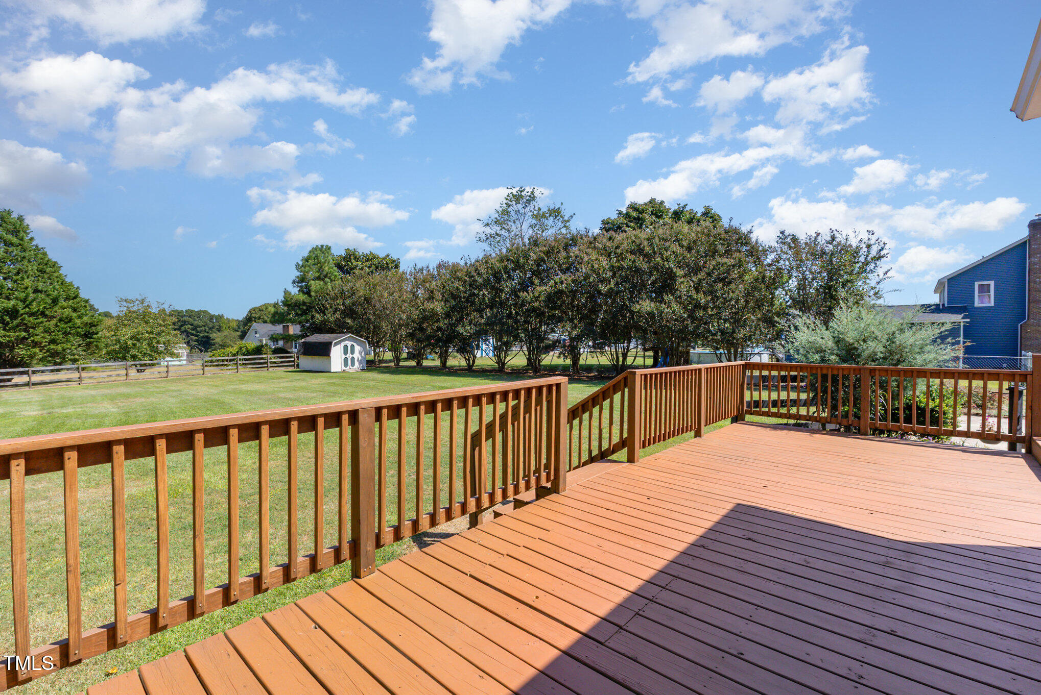 823 Shadow Lake Drive Willow Spring, NC 27592 - Photo 23 of 31 a view of balcony with wooden floor and fence
