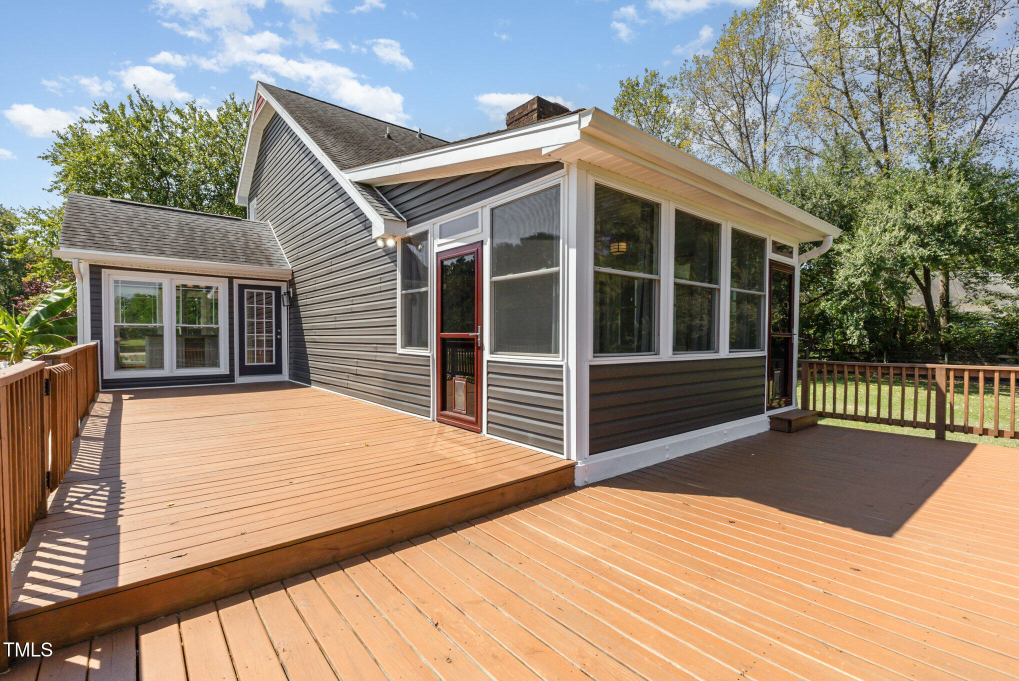 823 Shadow Lake Drive Willow Spring, NC 27592 - Photo 24 of 31 a view of house with deck and wooden floor