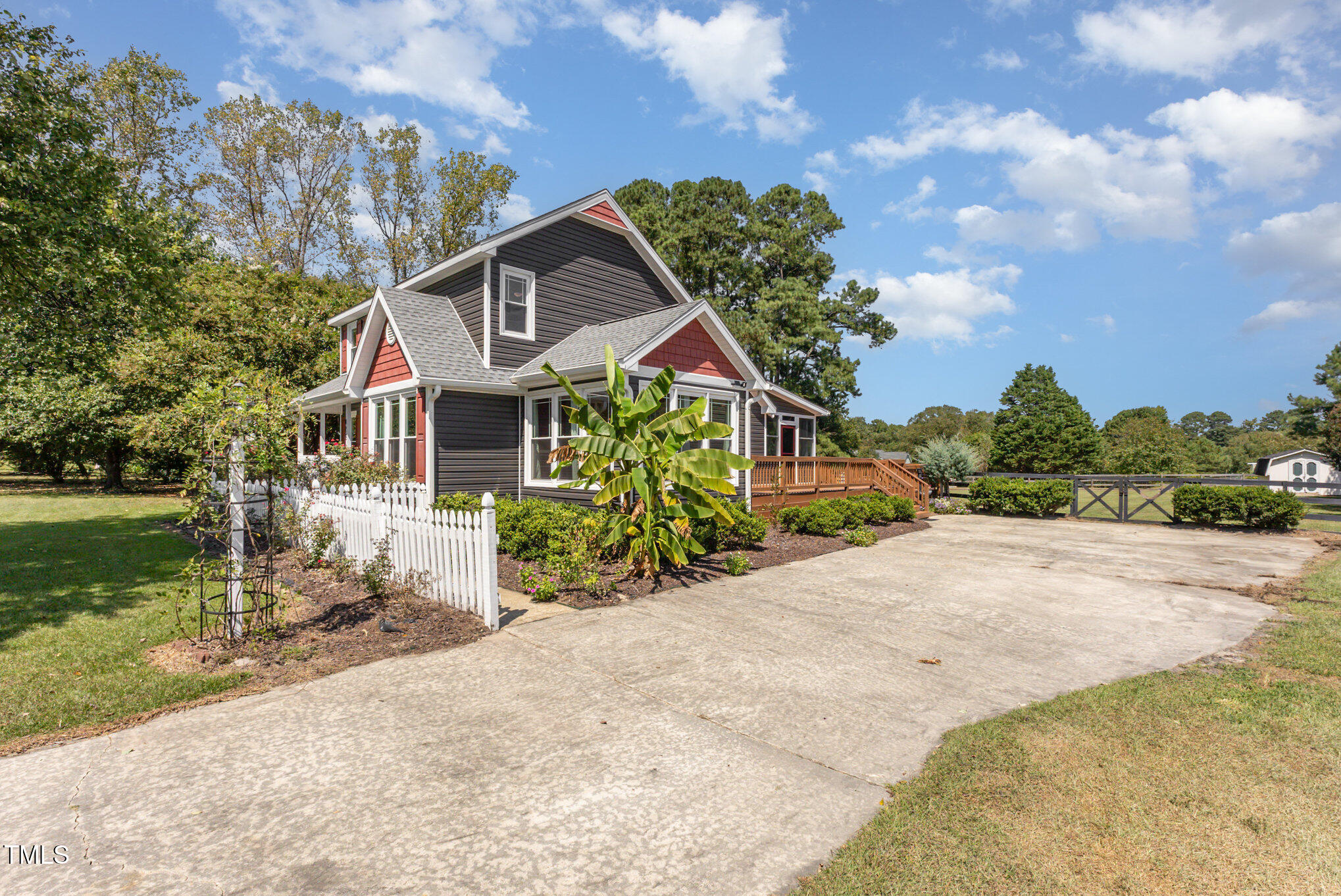 823 Shadow Lake Drive Willow Spring, NC 27592 - Photo 26 of 31 a view of a house with a yard
