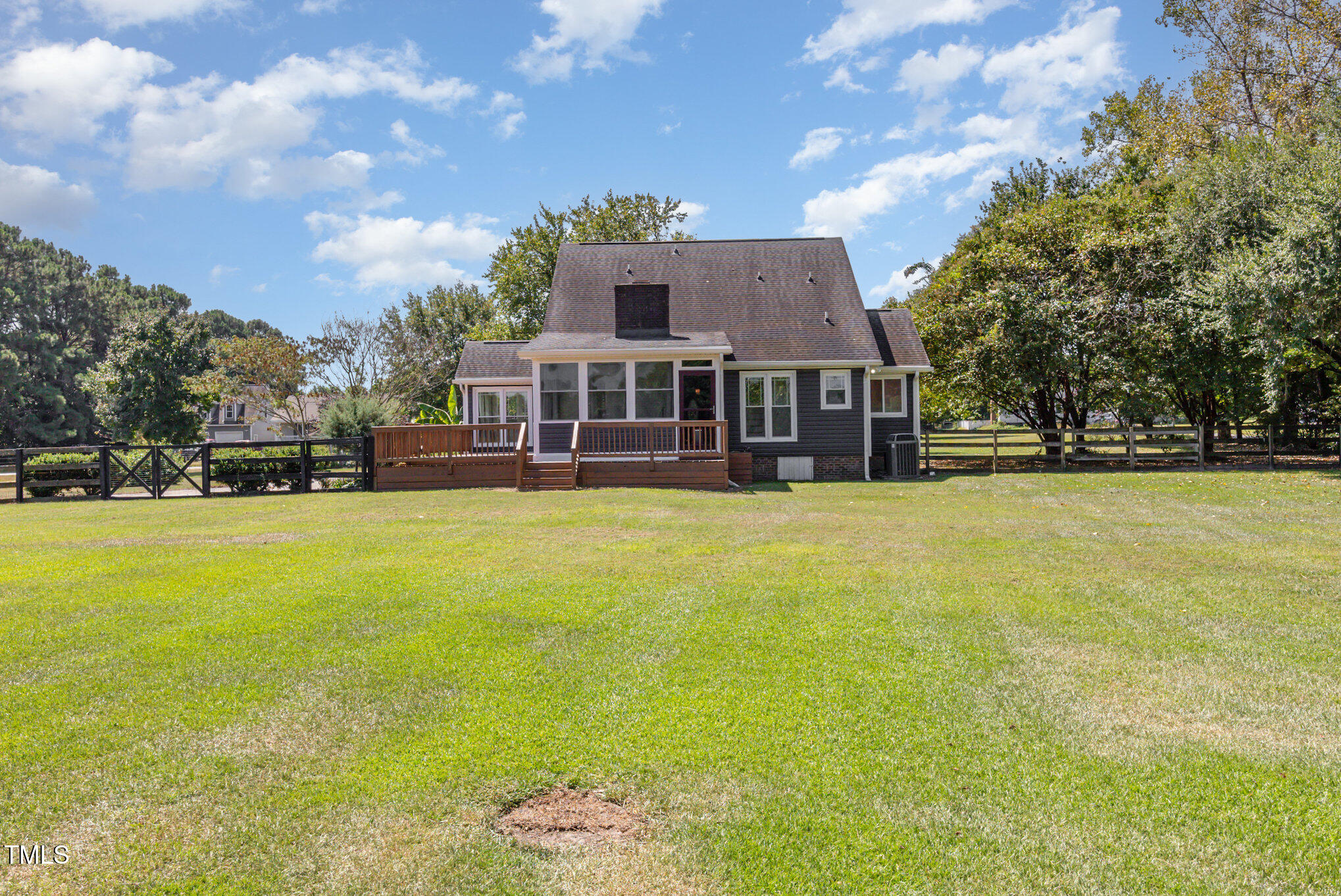823 Shadow Lake Drive Willow Spring, NC 27592 - Photo 28 of 31 a view of a house with a big yard