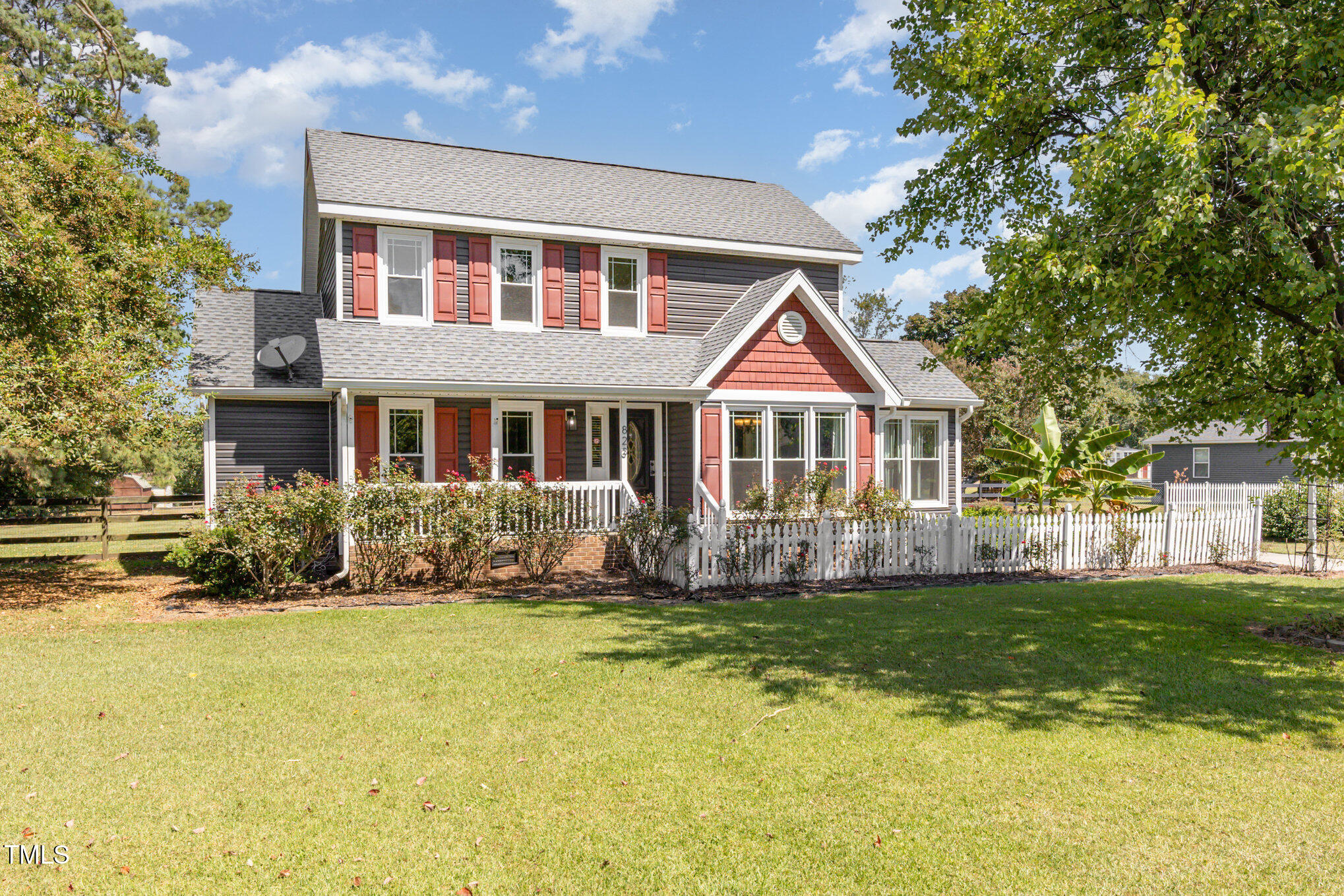 823 Shadow Lake Drive Willow Spring, NC 27592 - Photo 29 of 31 a front view of a house with a yard