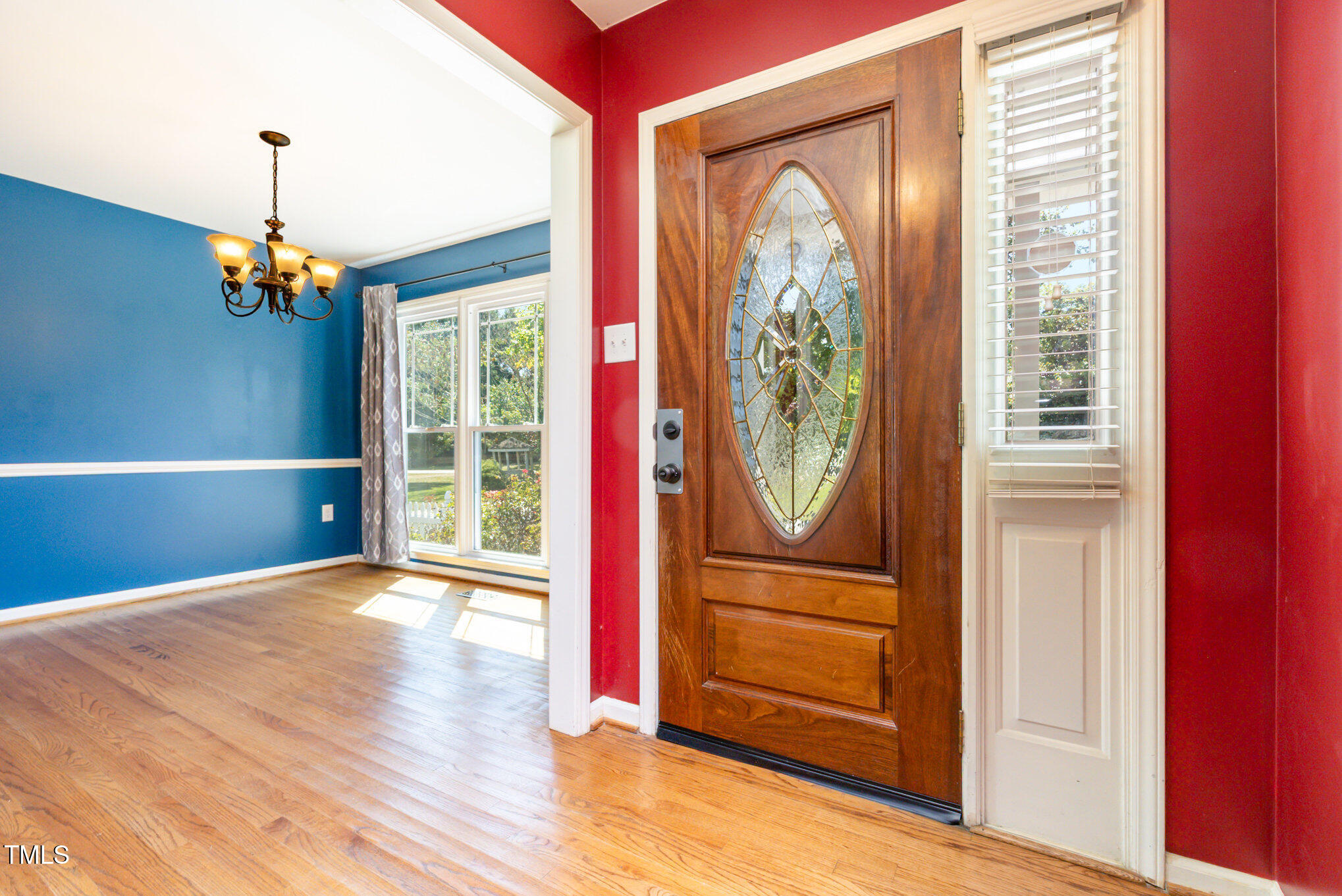 823 Shadow Lake Drive Willow Spring, NC 27592 - Photo 4 of 31 a view of an entryway with wooden floor