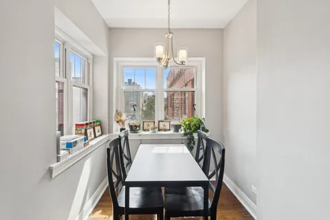 a view of a dining room with furniture