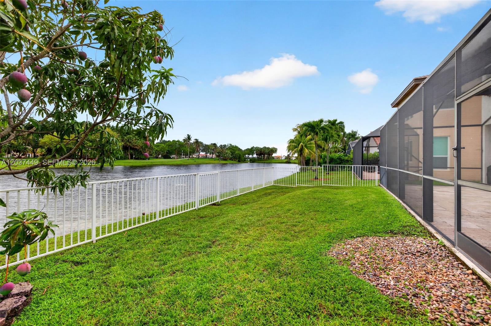 17488 Southwest 28th Court Miramar, FL 33029 - Photo 39 of 50 a view of a backyard with a garden