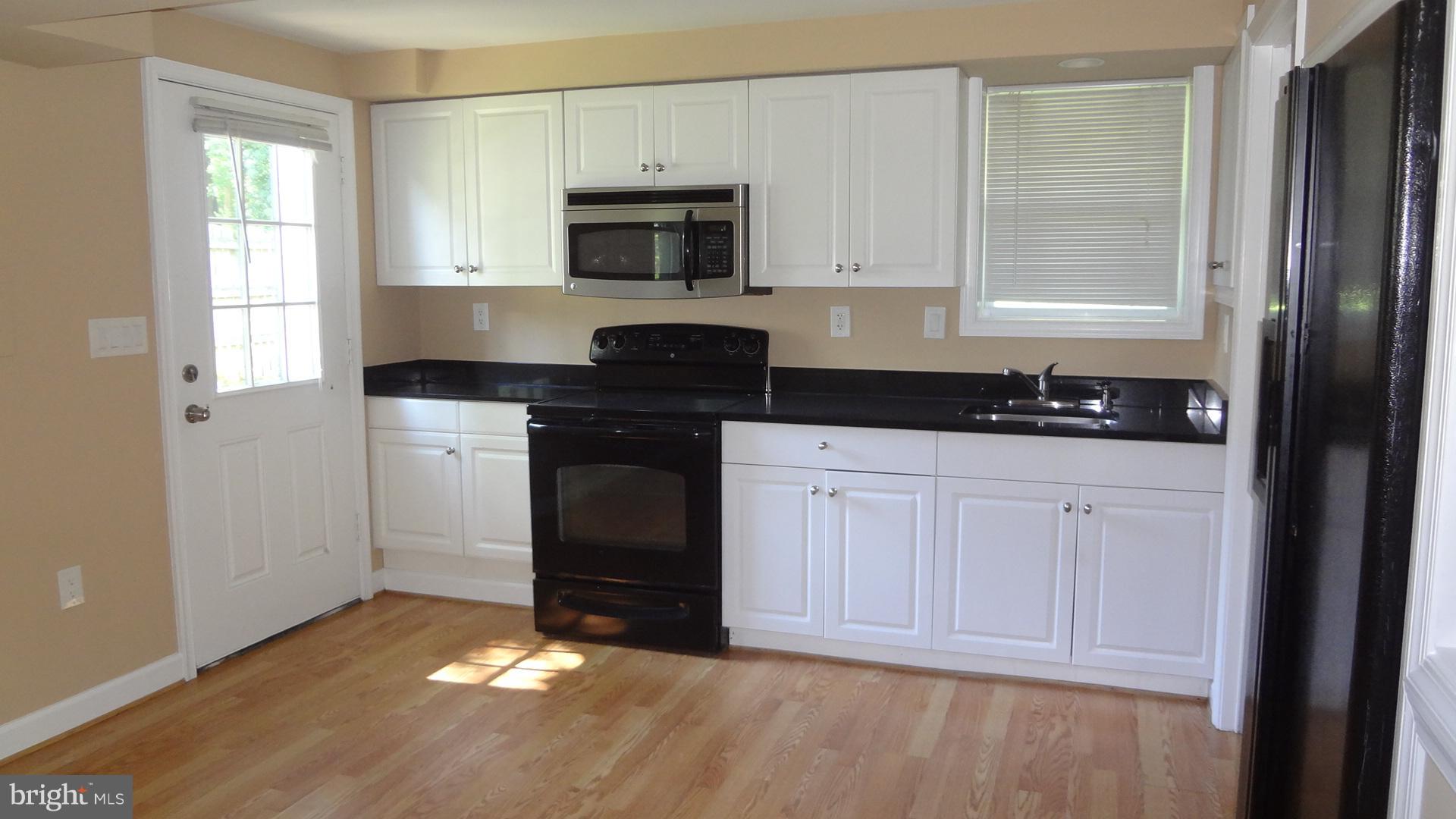 516 Beaumont Road Silver Spring, MD 20904 - Photo 18 of 21 Kitchen 2 Lower Level View 1