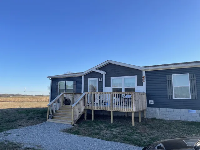 a view of a house with a roof deck
