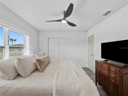 a bathroom with a sink a mirror and shower