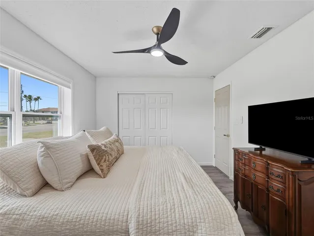a bathroom with a sink a mirror and shower