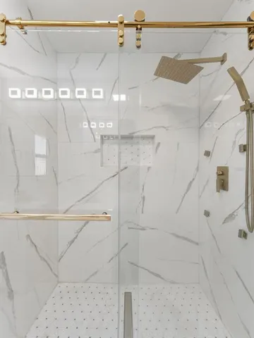 a bed room with a bed and a window